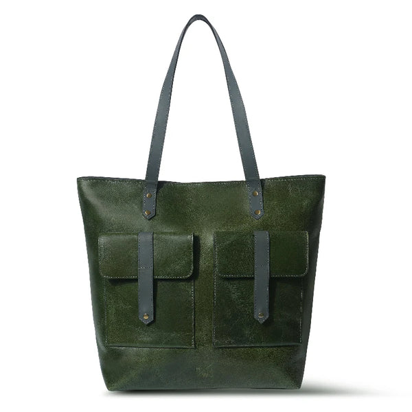 Green leather tote bag with two front pockets on a white background