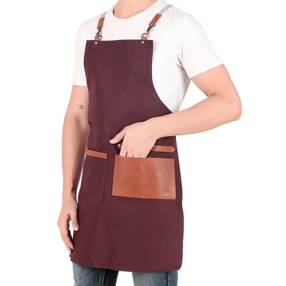 Person wearing a brown apron with a leather pocket on a white background