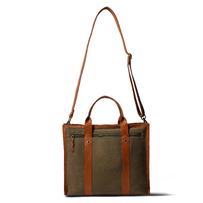 Brown tote bag with leather straps on a white background