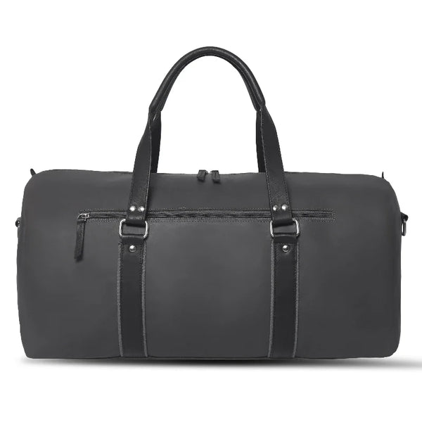 Black duffel bag with leather straps on a white background