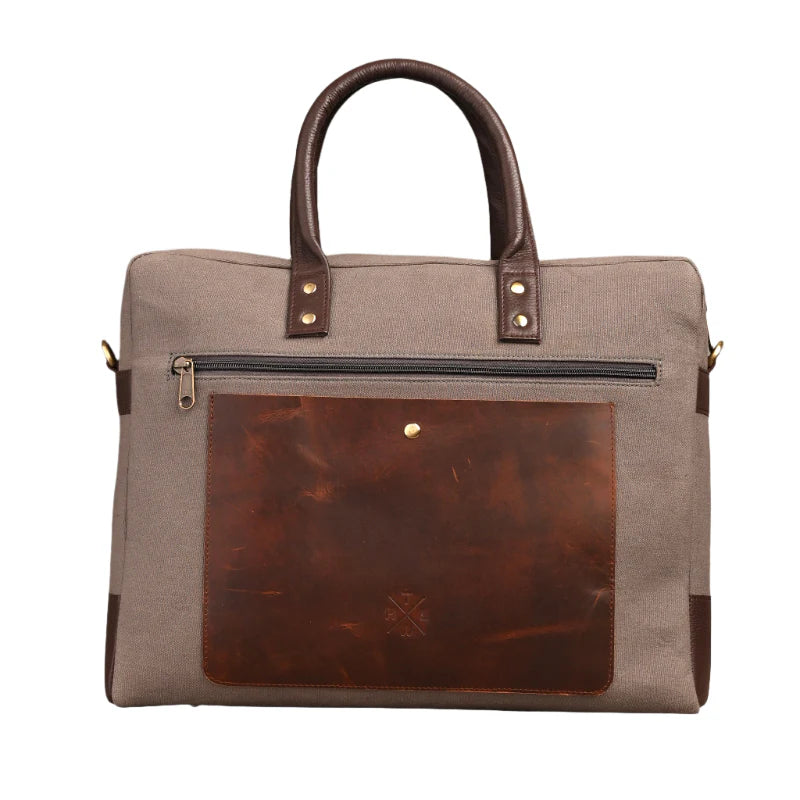 Brown bag with leather patch on a white background