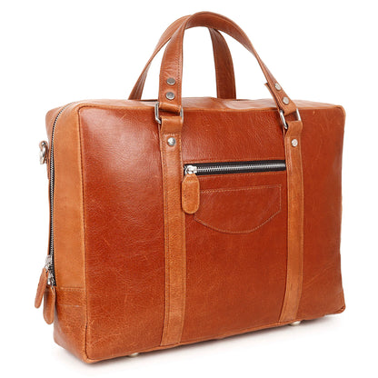 Brown leather bag with silver zippers on a white background