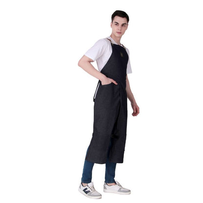 Person wearing a black apron on a white background