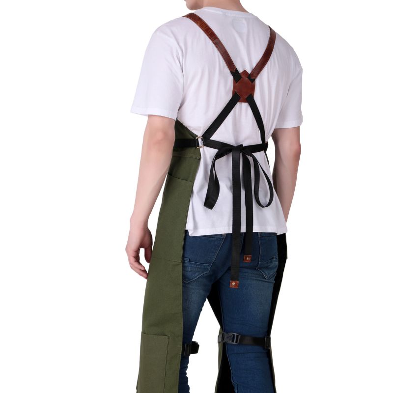 Person wearing a white shirt, green pants, and blue jeans with strap on a white background
