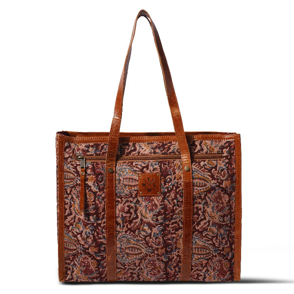 Brown tote bag with intricate pattern on a white background