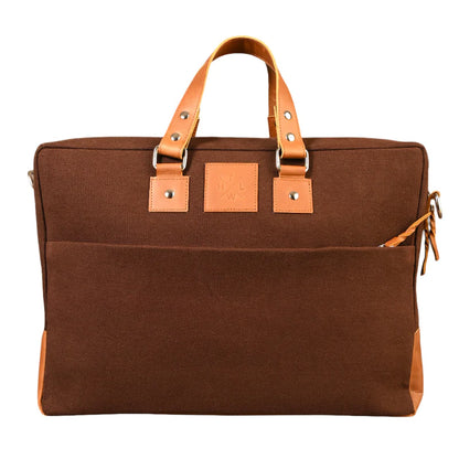 Brown bag with leather straps on a white background