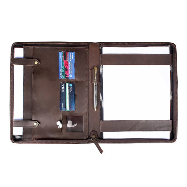 Brown leather organizer with card slots and a pen holder on a white background