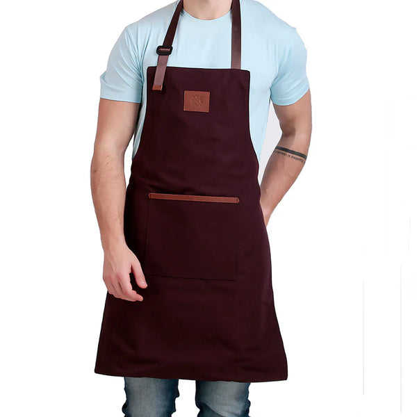 Person wearing a brown apron on a white background