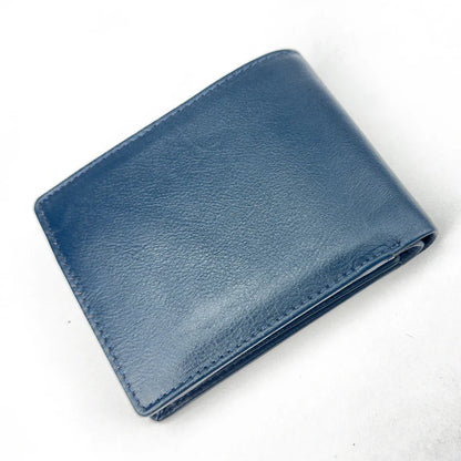 Blue leather wallet on a white background