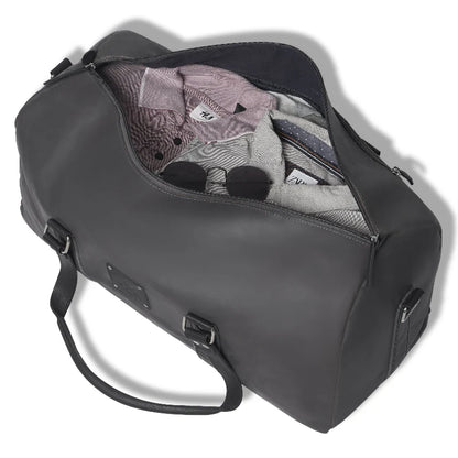 Gray duffel bag with clothes partially inside on a white background