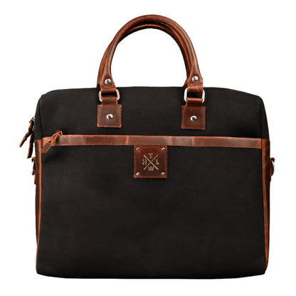 Black bag with brown leather accents on a white background
