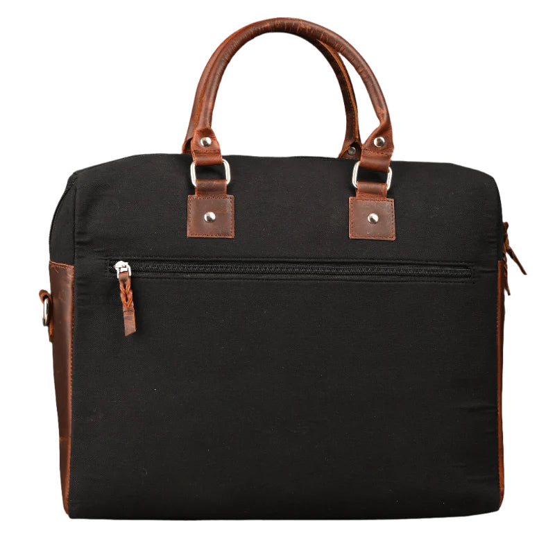 Black bag with brown handles and accents on a white background