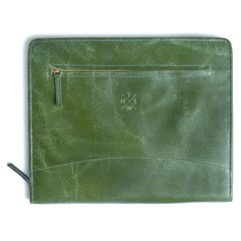 Green leather pouch with a zipper on a white background