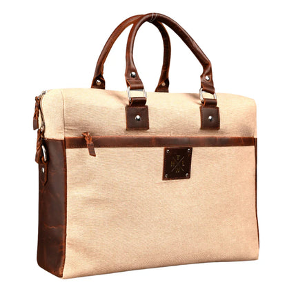 Beige briefcase with brown leather accents on a white background