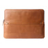 Brown leather laptop sleeve on a white background