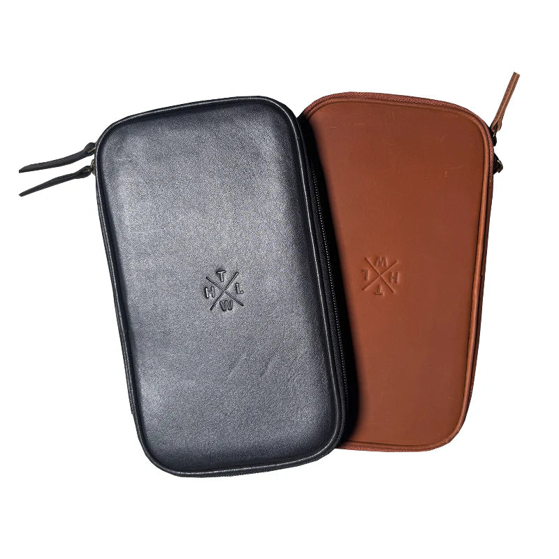 Black and brown leather cases with a visible brand logo on a white background