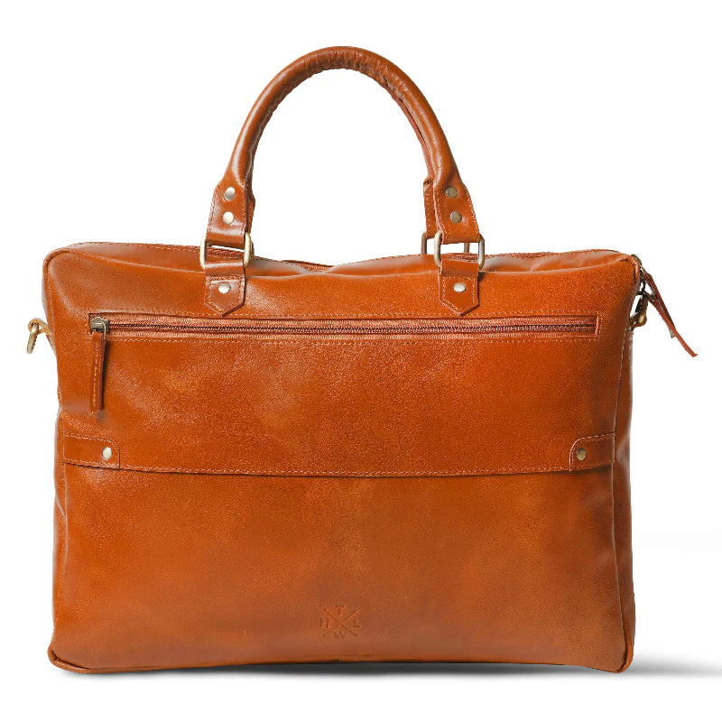 Brown leather bag with handles on a white background