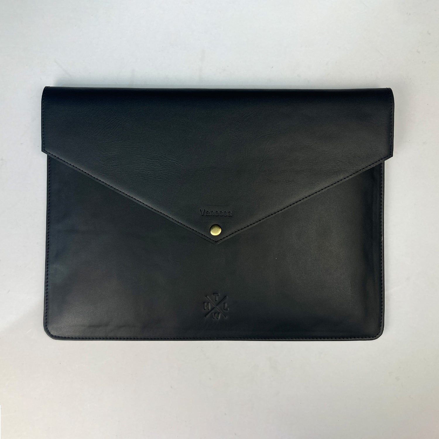 Black leather envelope on a white background