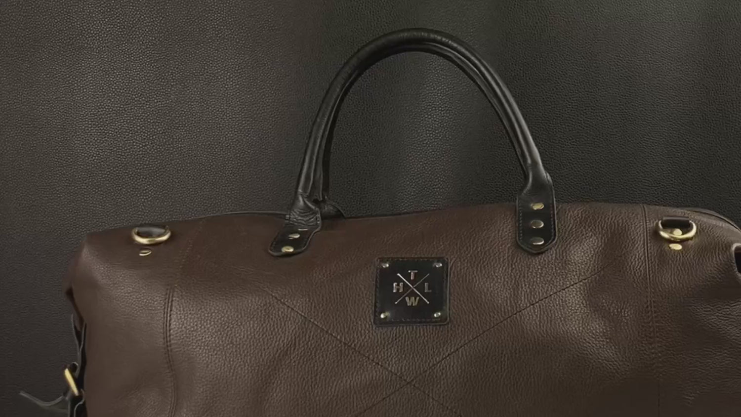 brown leather duffle bag