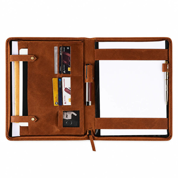 Open tan brown leather portfolio organizer with card slots, pen holders, document pockets, and secure closure