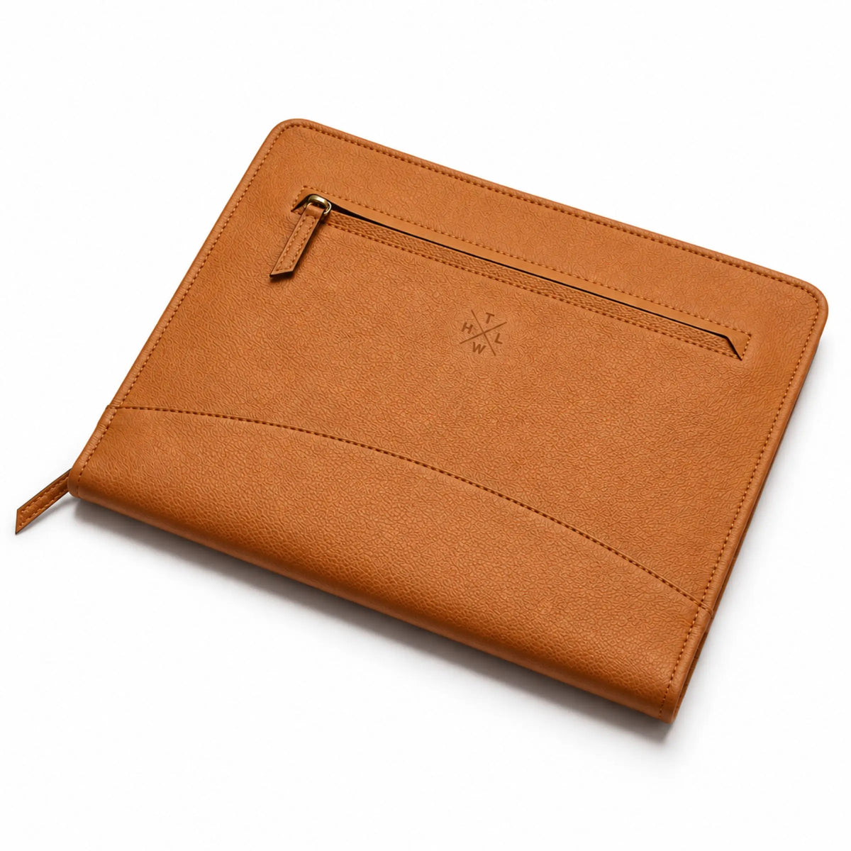 Angled view of a tan leather portfolio with a front zipper pocket and textured leather finish