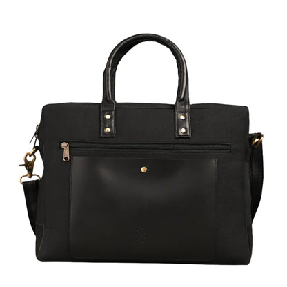 Black handbag with gold accents on a white background