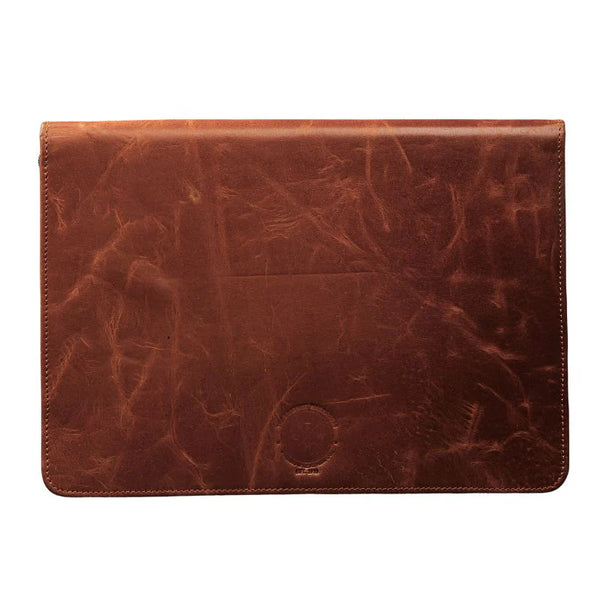 Brown leather pouch on a white background