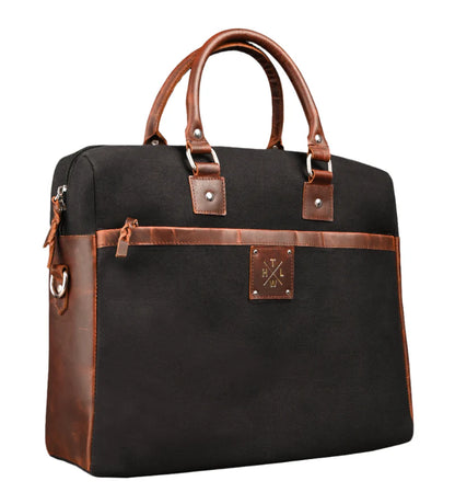 Black bag with brown leather accents on a white background