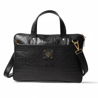 Black crocodiles with gold accents on a white background