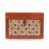 Brown leather clutch with floral pattern on a white background