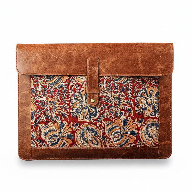 Brown leather clutch with floral pattern on a white background