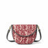 Floral patterned handbag with a strap on a white background