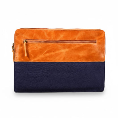 Two-toned orange and navy clutch bag on a white background